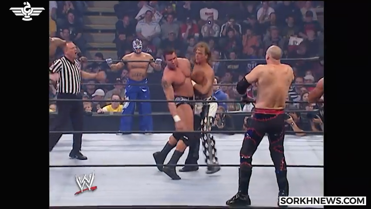 مبارزه کشتی کج راک مقابل براک لزنر در «سامراسلم 2002» بر سر کمربند قهرمانی WWE + ویدئو